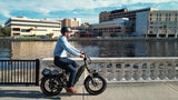 man-commuting-on-magicycle-ocelot-pro-electric-step-thru-fat-tire-e-bike
