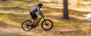 mountain-biker-shredding-through-south-march-highlands-kanata-on-aventon-ramblas-mid-drive-emtb